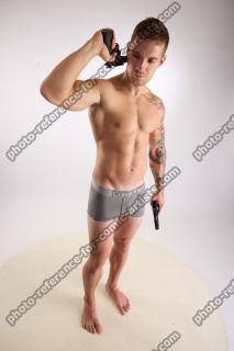 Piero Pose with Guns